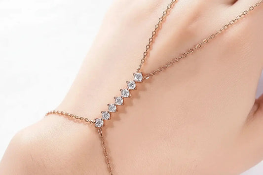 Rose gold Celestial Sparkle 7-stone adjustable Moissanite bracelet with sparkling gems on sterling silver chain for women.