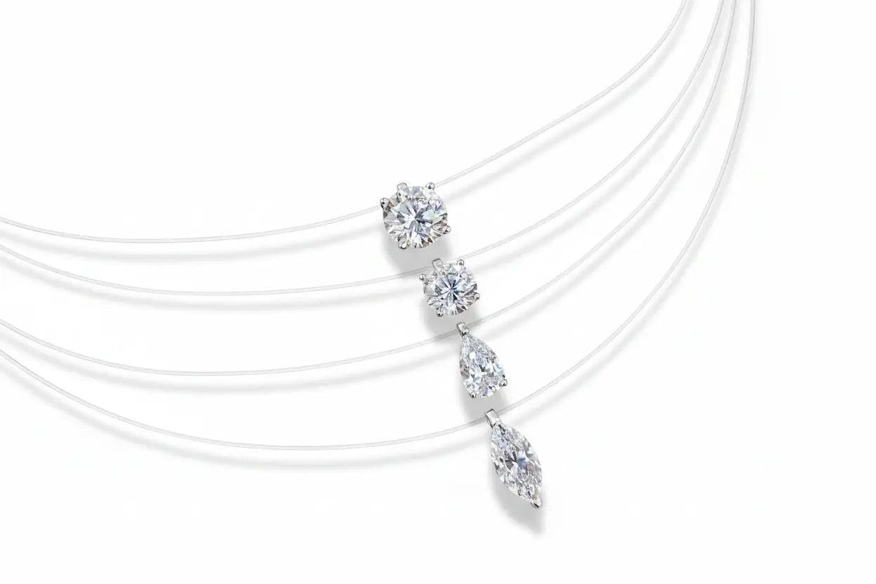 Zethech Signature Silhouette Moissanite Pendant necklace featuring oval and round-cut moissanite stones on sterling silver chain.