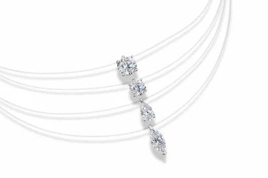 Zethech Signature Silhouette Moissanite Pendant necklace featuring oval and round-cut moissanite stones on sterling silver chain.