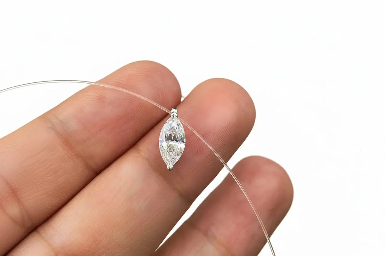 Zethech Signature Silhouette Moissanite Pendant necklace with oval, pear, and round cuts on sterling silver chain, elegant jewelry gift