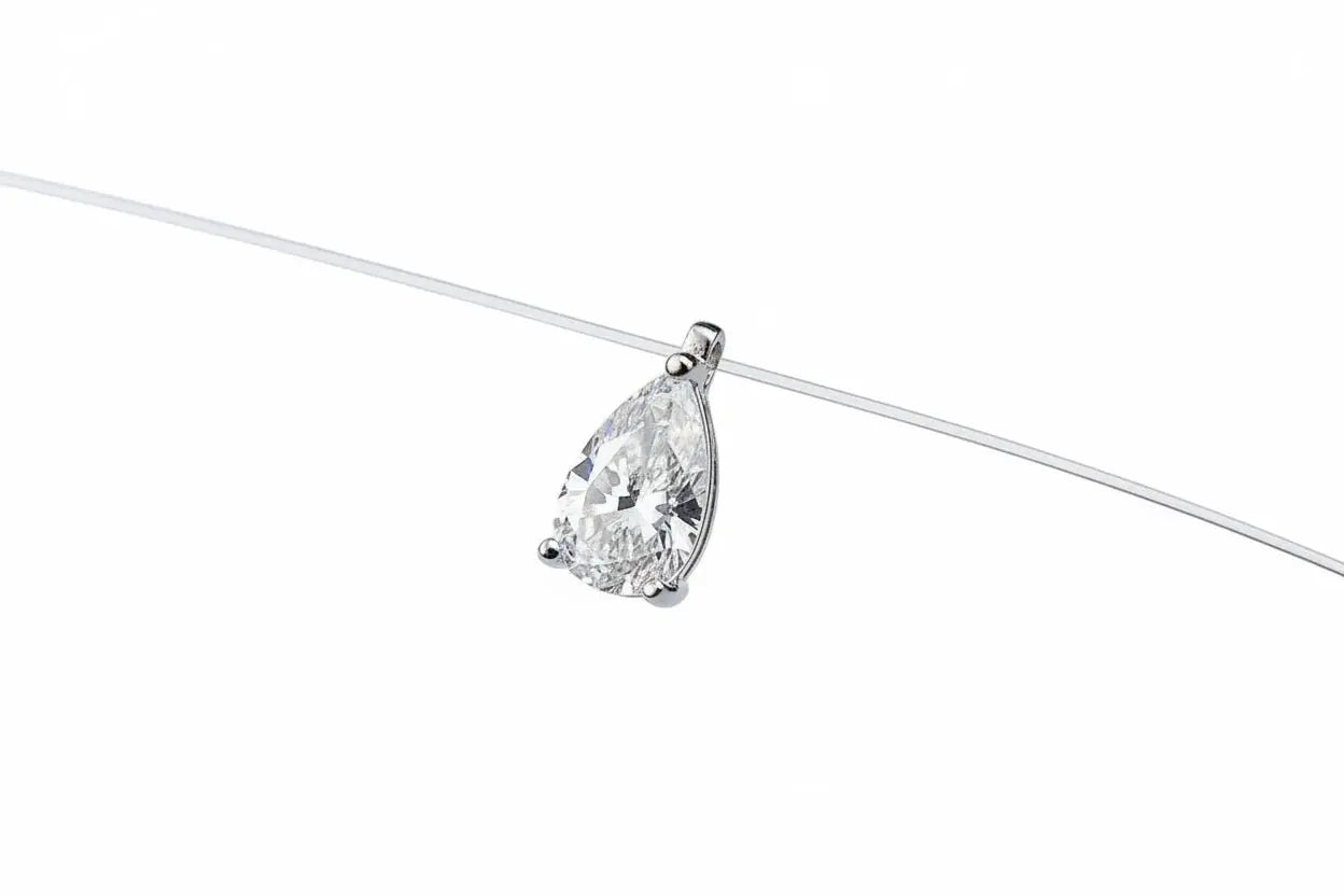 Zethech Signature Silhouette Moissanite Pendant necklace featuring oval-cut, pear, marquise, and round brilliant cuts in S925 silver.