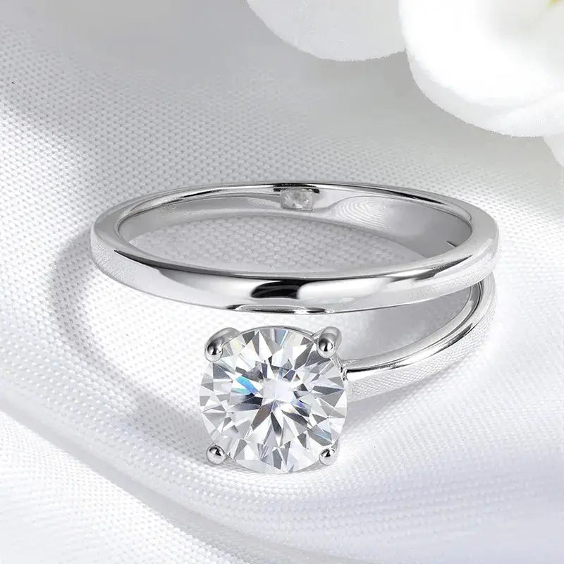 Silver 2CT moissanite solitaire ring by Zethech with brilliant-cut gemstone, perfect as a wedding band or elegant jewelry piece.