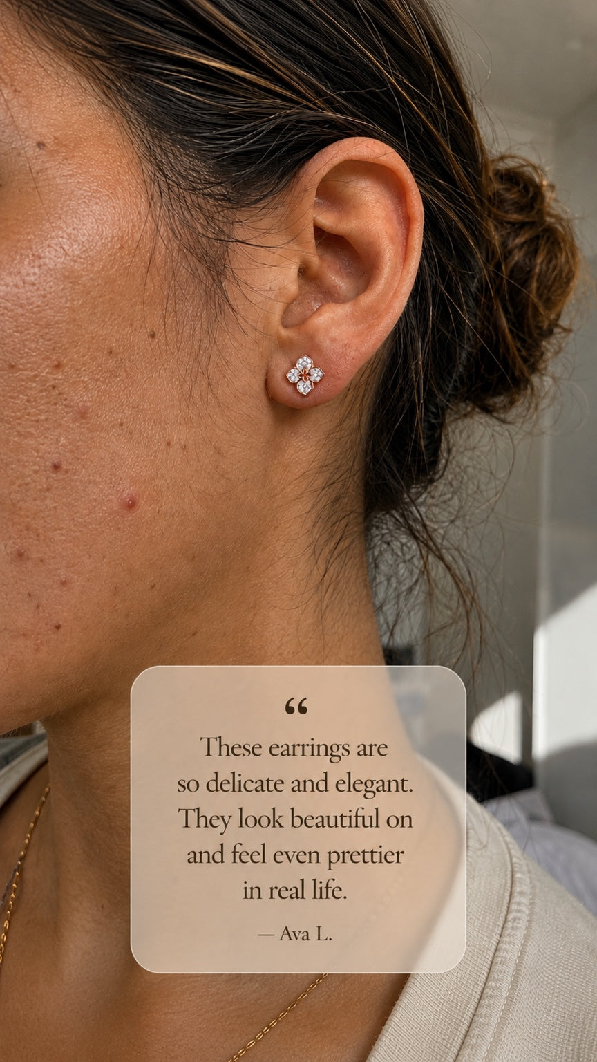 Customer wearing floral moissanite stud earrings. Testimonial: “These earrings are so delicate and elegant. They look beautiful on and feel even prettier in real life.” — Ava L.