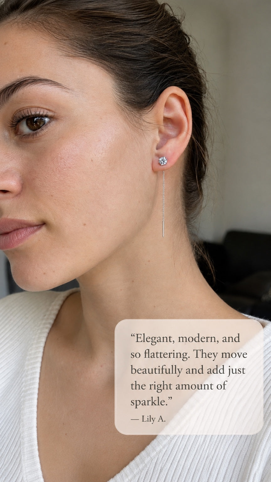 Customer wearing moissanite threader earrings. Testimonial: “Elegant, modern, and so flattering. They move beautifully and add just the right amount of sparkle.” — Lily A.