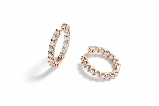 Gold-colored Zethech Eternal Glow 2.5mm full Moissanite hoop earrings, showcasing sparkling gemstone accents and sleek hoop design.