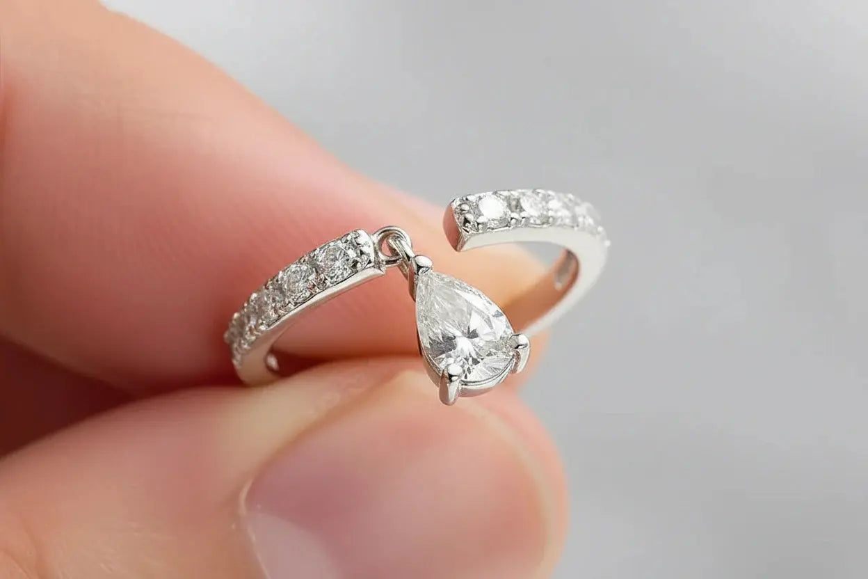 Zethech Pear Cut Moissanite Ring in sterling silver band