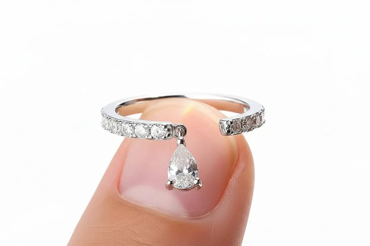 Zethech Pear Solitaire Moissanite Ring with polished band