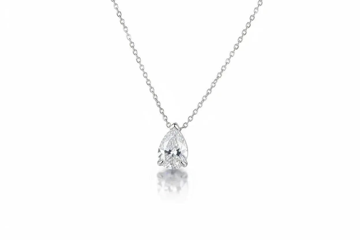 Elegant gold necklace with a 1-4 carat pear-cut moissanite pendant, featuring a fine silver 925 chain for women and girls.