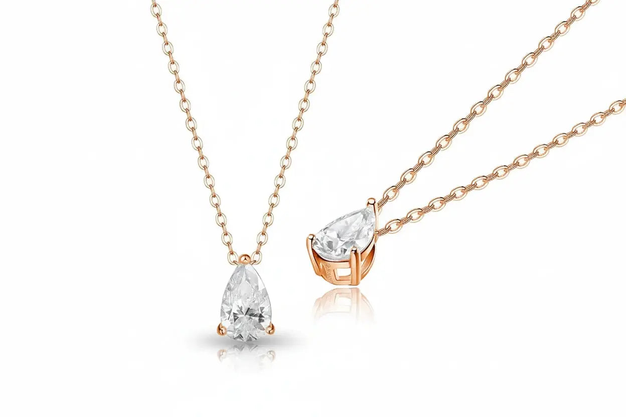 Gold pendant necklace featuring a 1-4 carat pear cut moissanite by Zethech., delicate fine jewelry for women and girls.
