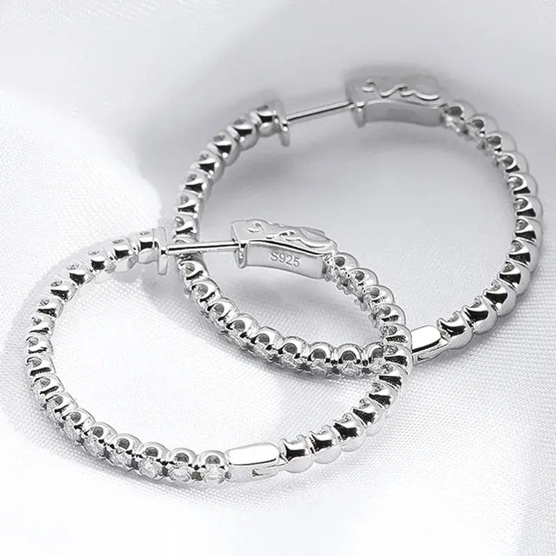 Silver Zethech Starlight Glamour Moissanite Statement Hoop Earrings with sparkling full stone design.