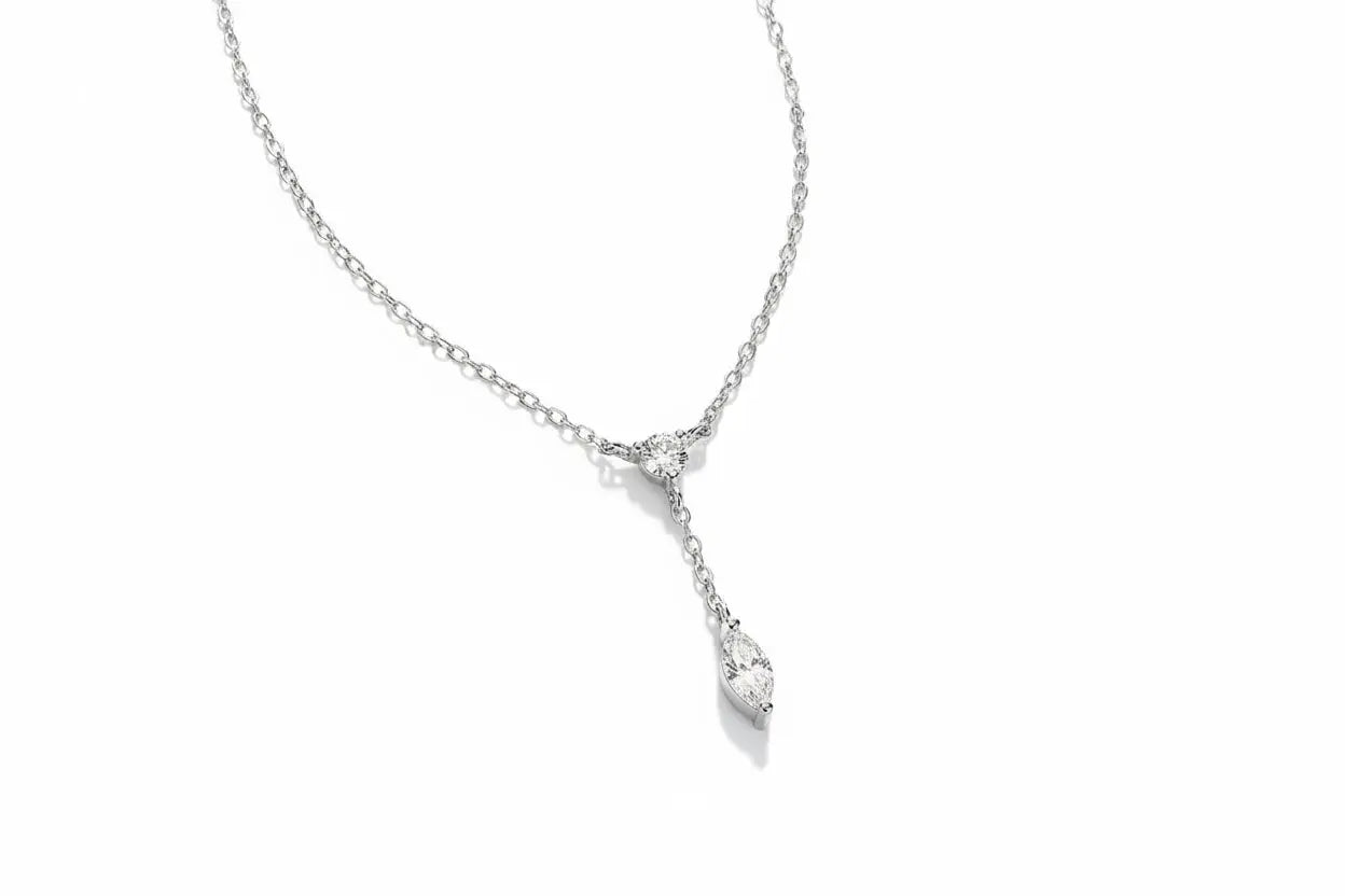 Zethech rose gold moissanite pendant necklace with marquise cut gemstone on sterling silver chain for women.