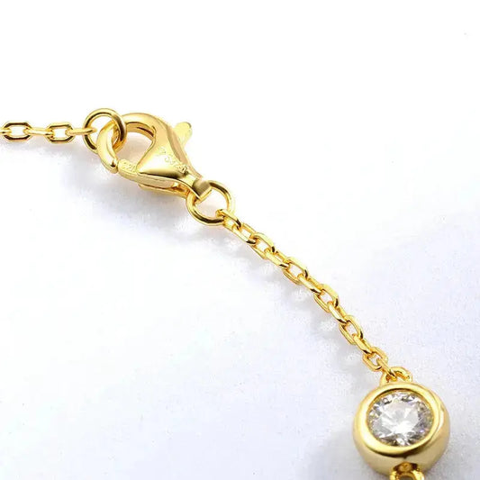 Silver Zethech Radiant Bubble Moissanite Tennis Bracelet with sparkling round stones on a delicate chain.