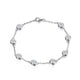 Silver Radiant Bubble Moissanite Tennis Bracelet by Zethech with sparkling stones on a delicate chain.