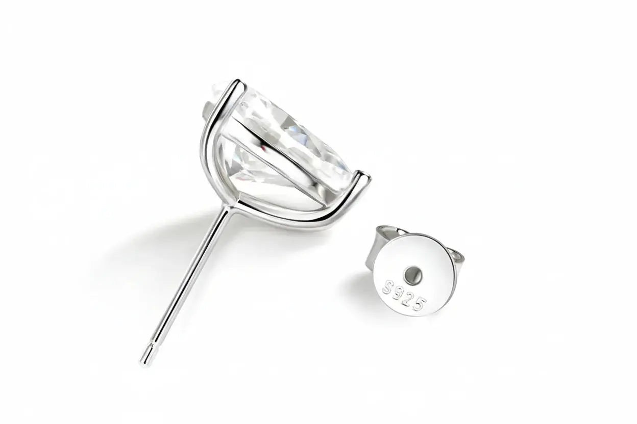 Silver sterling silver stud earrings with pear-cut moissanite gemstones, 1 carat each, plated with 18k gold for women.