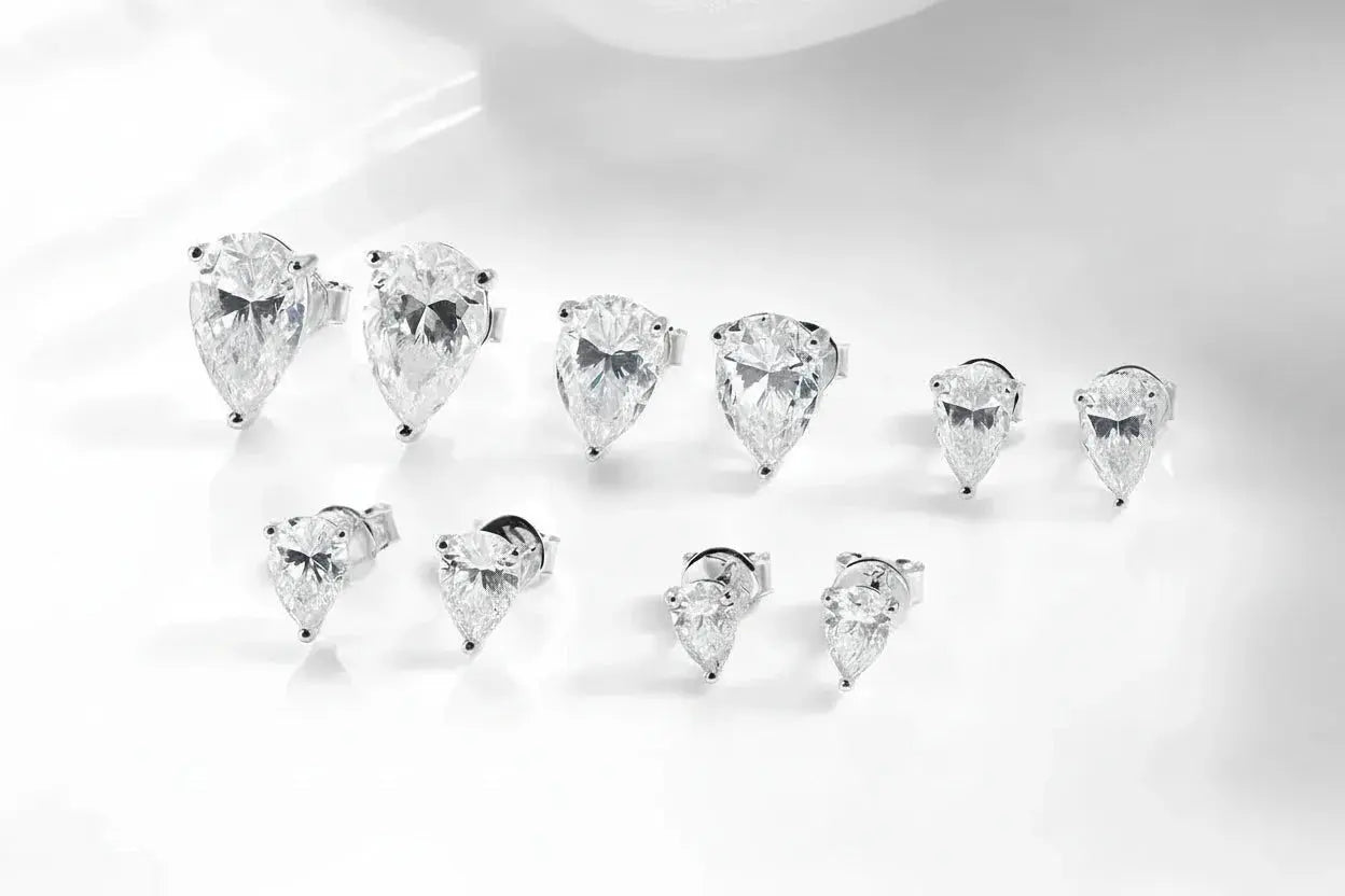 Zethech silver pear-cut moissanite stud earrings with 1 carat each, 18K gold plating, perfect for women’s wedding jewelry.