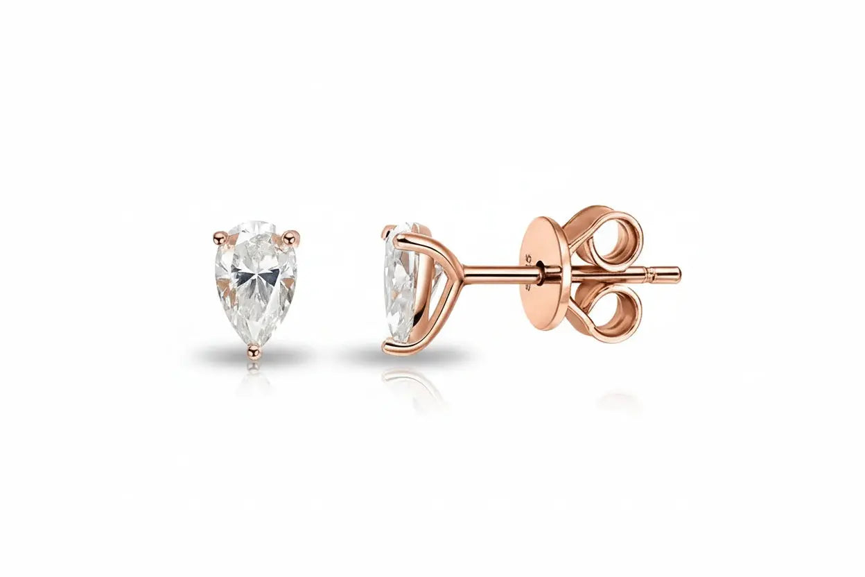 Silver Zethech Radiant Teardrop Moissanite Stud Earrings with pear cut, 1ct each, sterling silver and 18k gold plating for women.