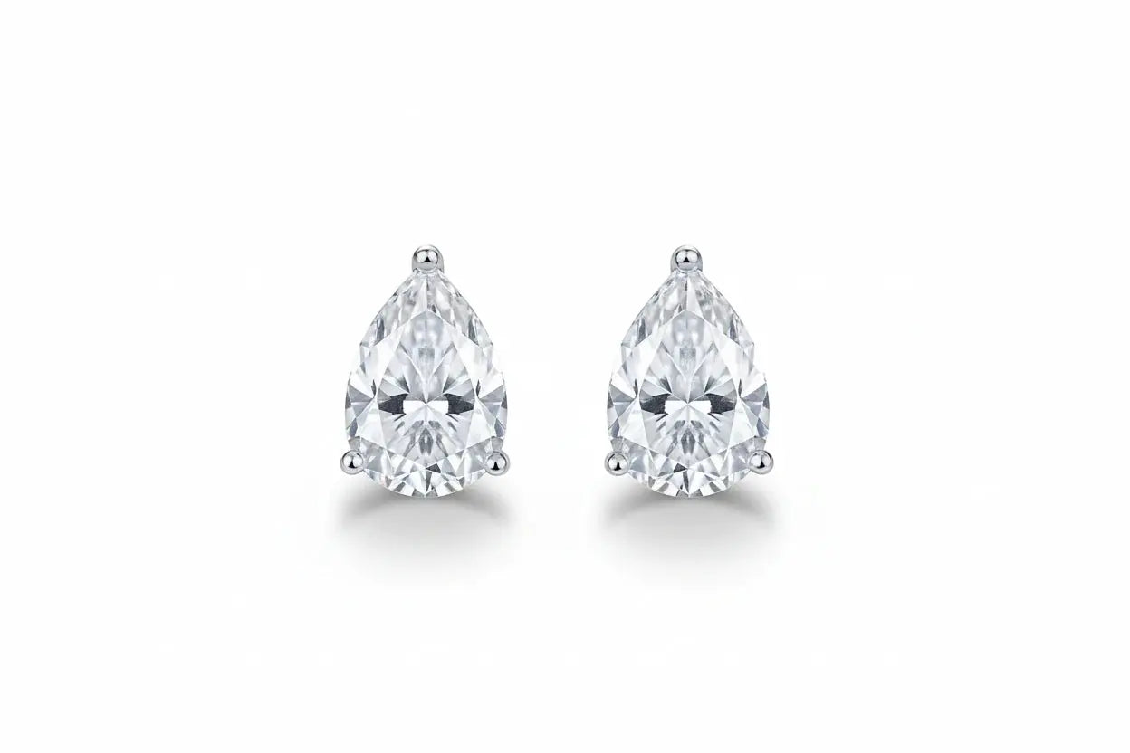 Silver-colored Zethech Radiant Teardrop Moissanite Stud Earrings with pear cut, 1ct each, sterling silver and 18k gold plating for women.