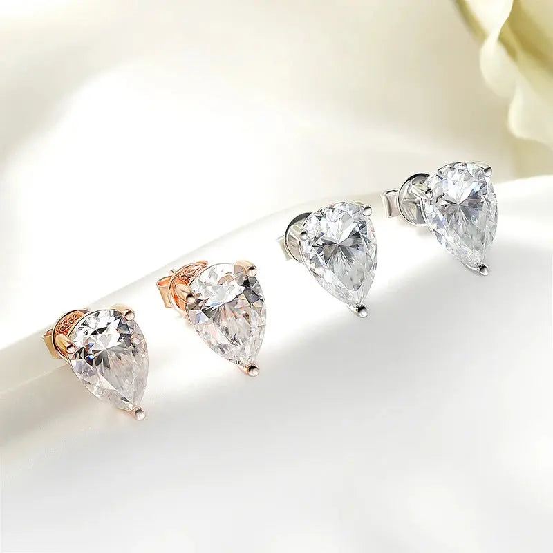 Silver-colored Zethech Radiant Teardrop Pear Cut Moissanite Stud Earrings in 1ct size, sterling silver with 18k gold plating for women.