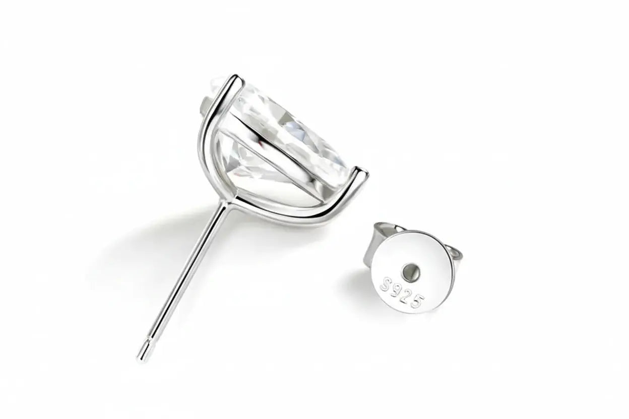Silver-colored Zethech Radiant Teardrop Moissanite Stud Earrings with pear-cut, 1ct each, sterling silver and 18k gold plating for women.
