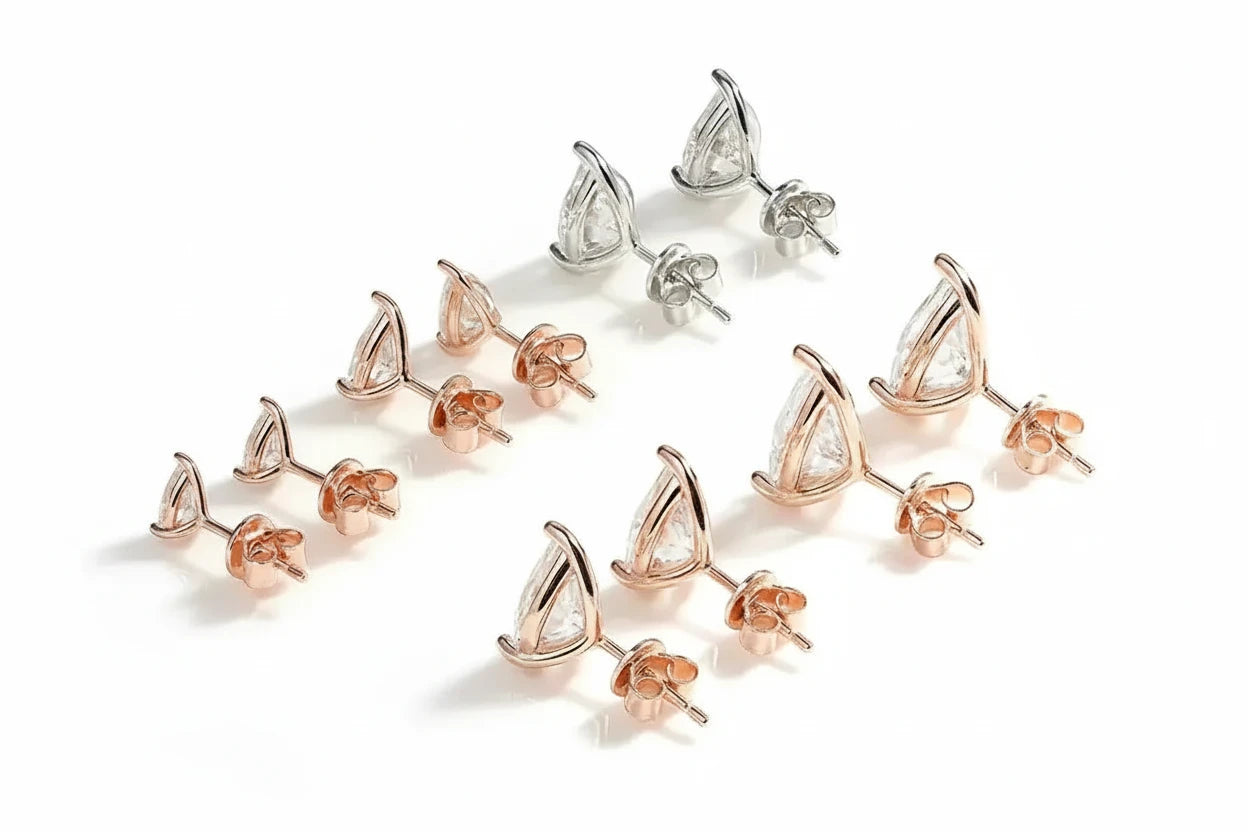 Silver-colored Zethech Radiant Teardrop Moissanite Stud Earrings with pear cut, 1ct each, sterling silver and 18k gold plating.