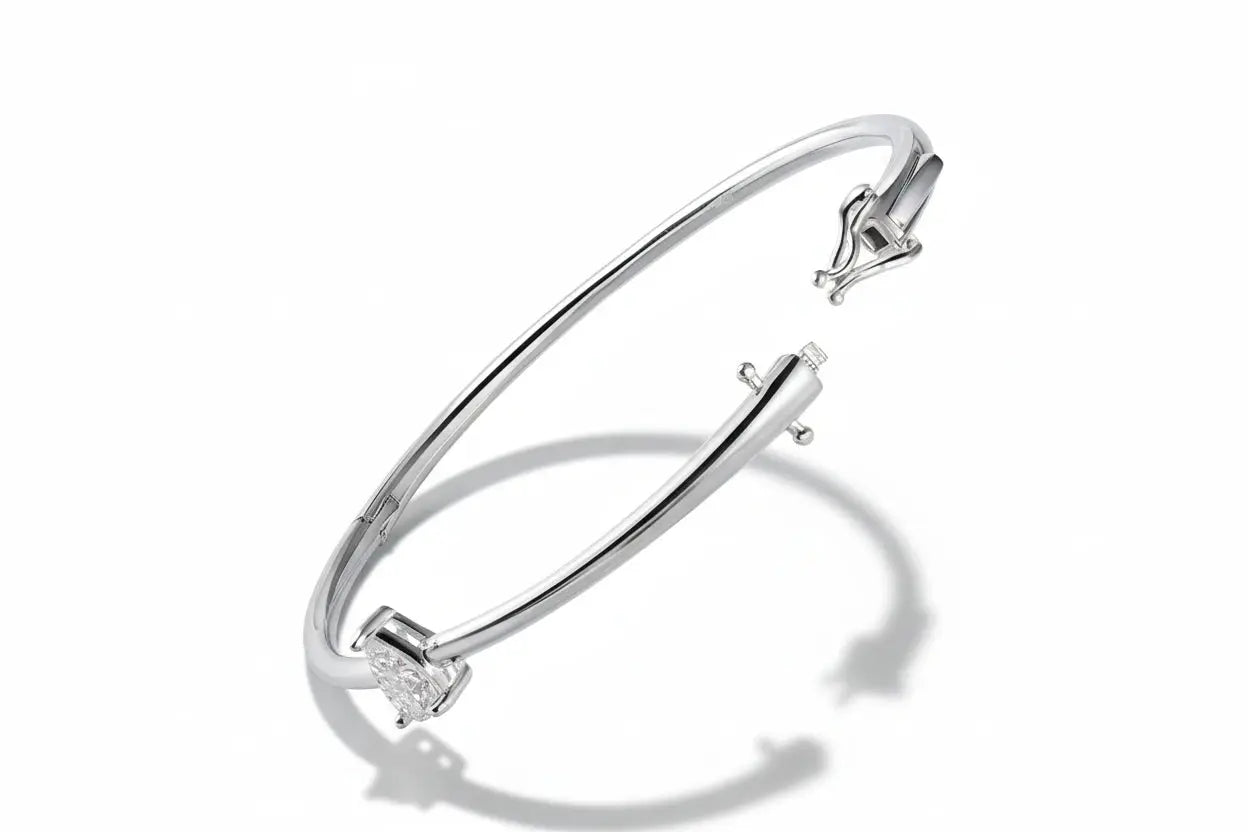 Zethech Pear Solitaire Bangle in S925 silver with pear-cut moissanite