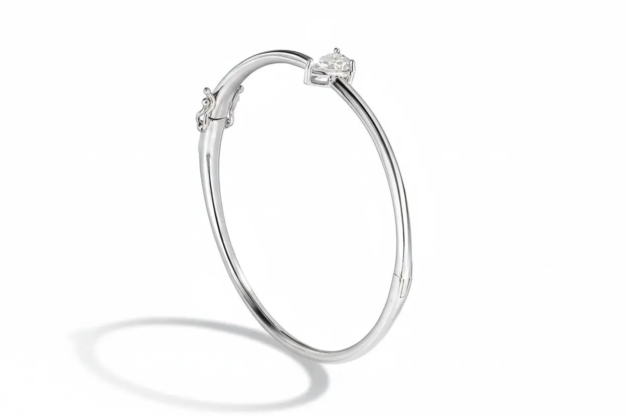 Zethech Pear Solitaire Bangle silver finish with pear-cut moissanite detail