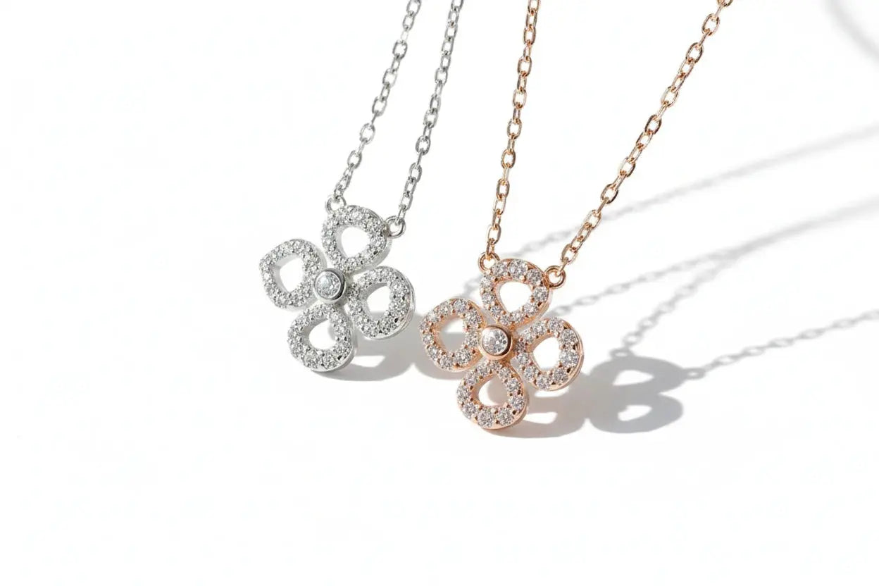 Silver Zethech Moissanite Flower Necklace with sparkling flower pendant on a delicate chain, sterling silver plated 18k.