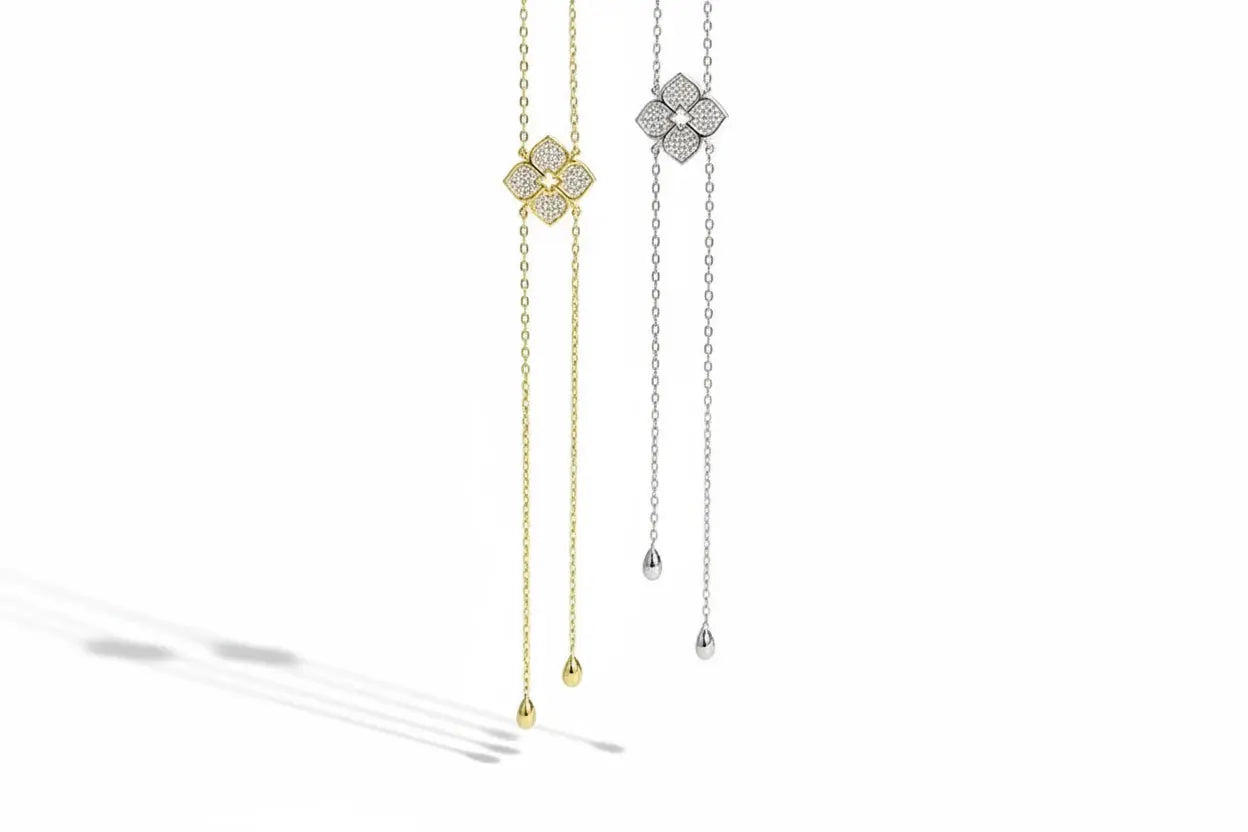 Silver floral moissanite pendant necklace by Zethech featuring sparkling gemstone and intricate floral design.