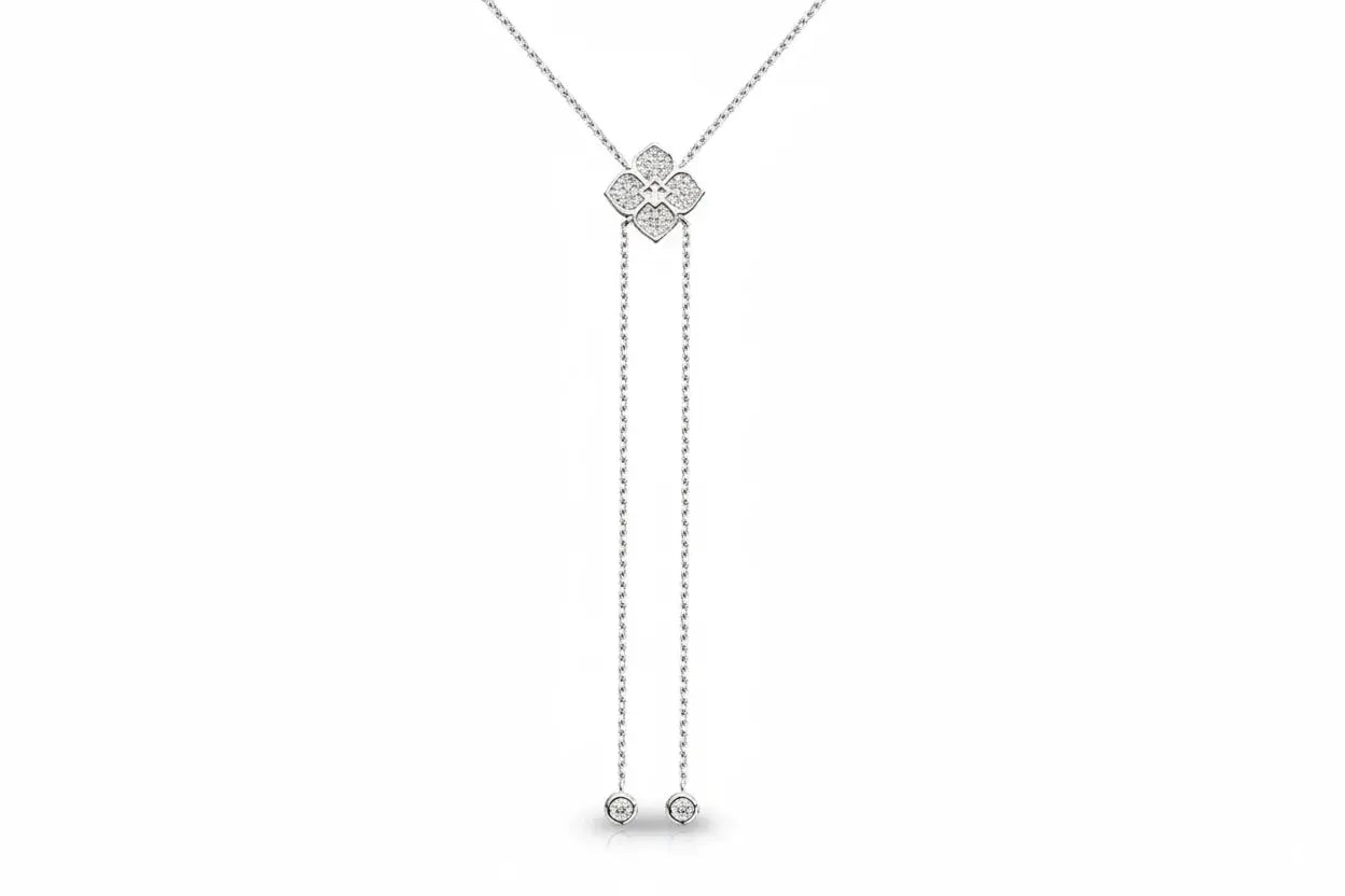 Silver floral moissanite pendant necklace by Zethech, featuring sparkling gemstone detailing and intricate floral design.