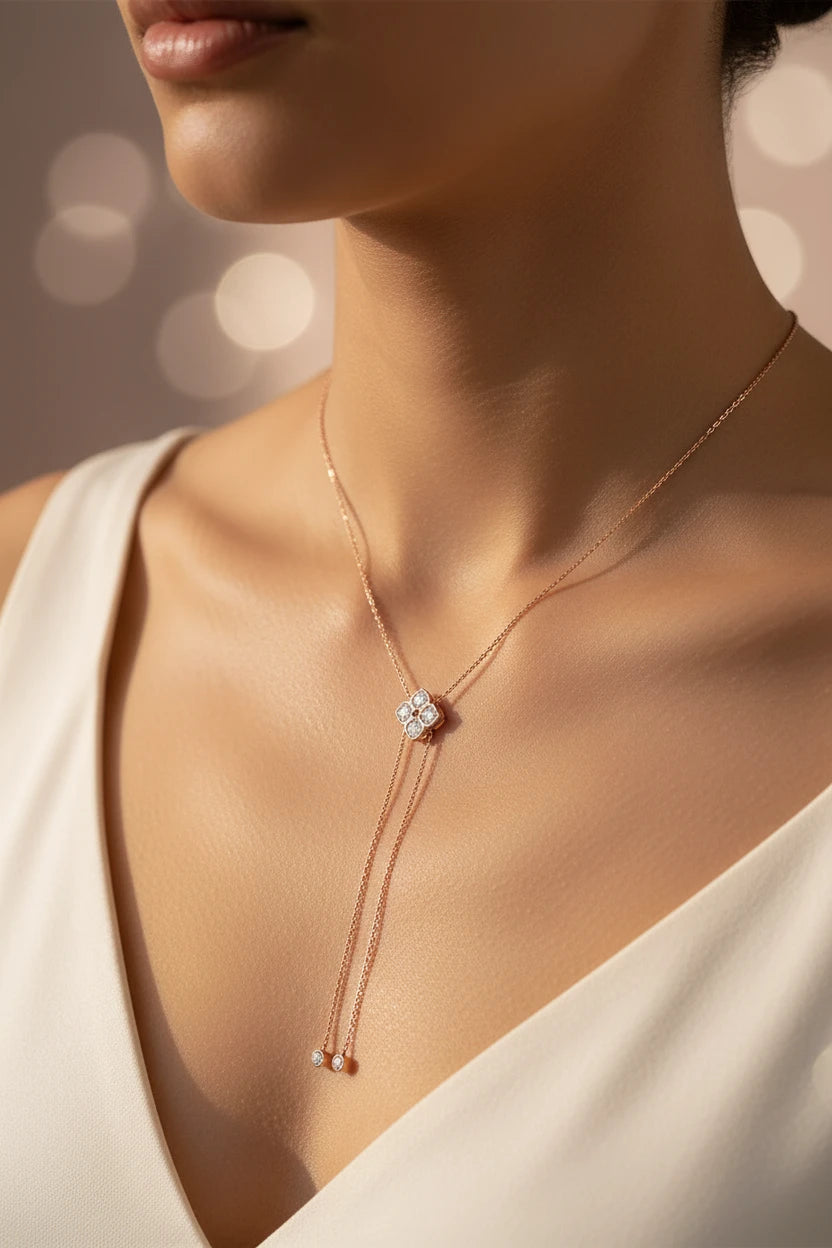 Silver floral moissanite pendant necklace by Zethech featuring sparkling gemstone accents and intricate floral design.