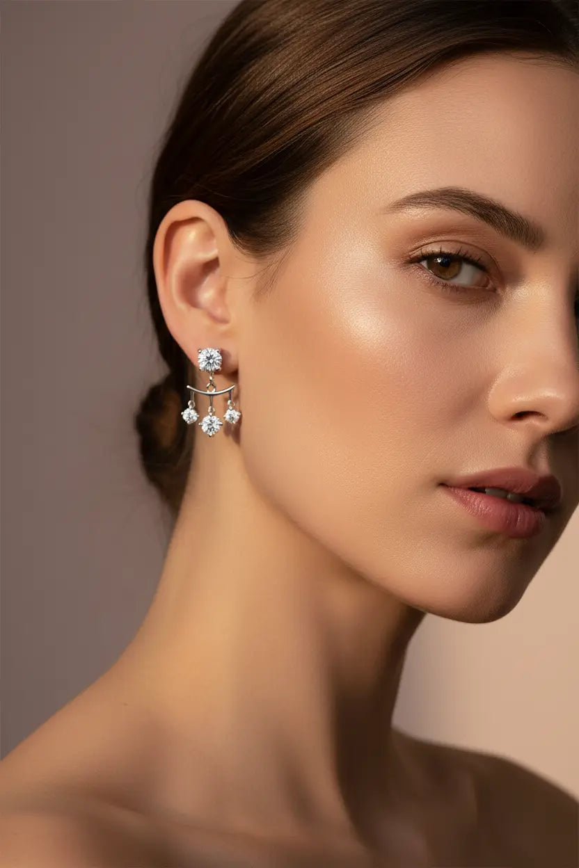 Silver Zethech drop earrings with luminous 2cttw moissanite stones, elegant and sparkling for special occasions.