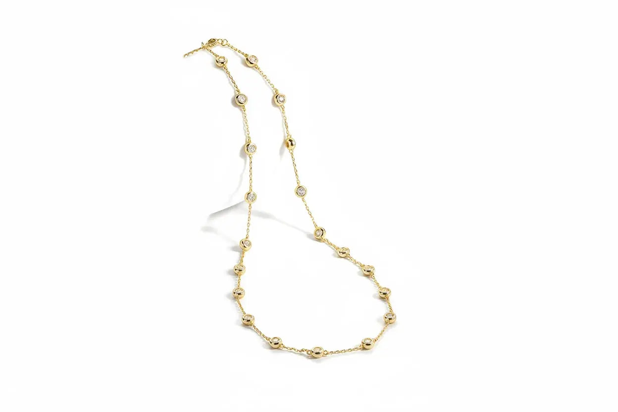 Silver moissanite tennis necklace by Zethech with radiant array 2cttw sparkling stones, elegant jewelry for special occasions.