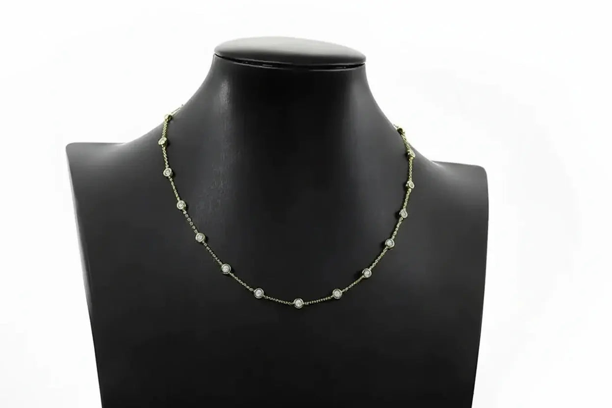 Silver Zethech Radiant Array 2CTTW Moissanite Tennis Necklace with sparkling gemstones on a delicate chain.