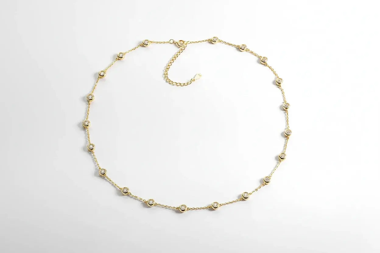 Silver moissanite tennis necklace with radiant array 2cttw stones, showcasing sparkling brilliance and elegant design by Zethech.