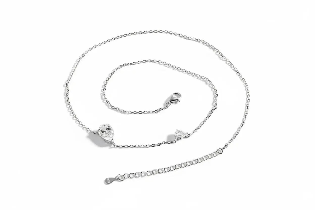 Zethech 2.5CT twin pear-shaped moissanite necklace with sterling silver chain, all lab-grown diamonds for women.