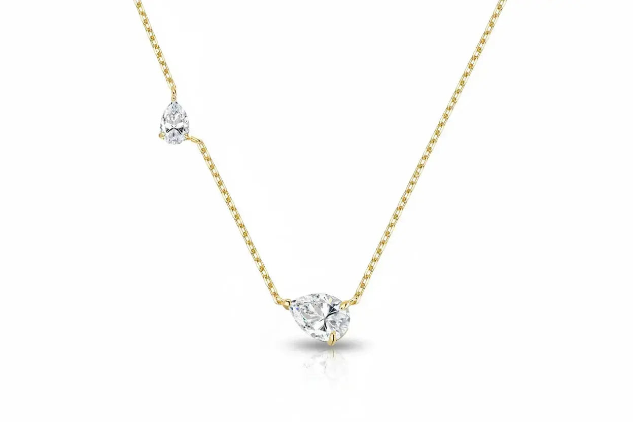 Zethech 2.5CT twin pear-shaped moissanite necklace with sterling silver chain for women, featuring two sparkling lab-grown gems.