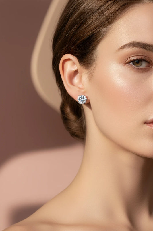 Zethech white gold moissanite stud earrings with round 2ct VVS1 lab diamonds in 14k gold-plated sterling silver.