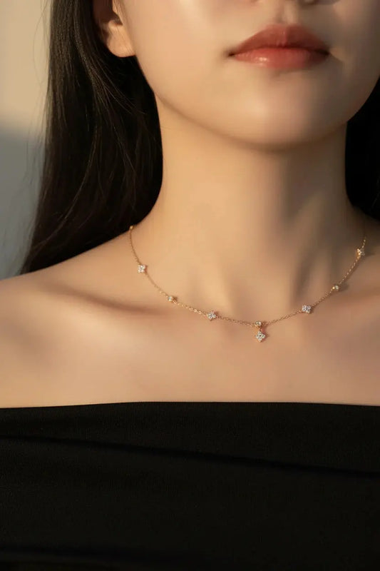 Zethech Moissanite necklace for women featuring a four-leaf clover diamond pendant on 18k gold-plated sterling silver chain.